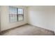 Simple bedroom with carpeted floor and window with blinds at 15250 Anguilla Isle Ave, Tampa, FL 33647