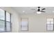 Bright bedroom with multiple windows and window blinds at 15250 Anguilla Isle Ave, Tampa, FL 33647