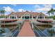 Community clubhouse with lakefront views and decks at 15250 Anguilla Isle Ave, Tampa, FL 33647