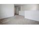 Spacious loft area with neutral decor and carpet at 15250 Anguilla Isle Ave, Tampa, FL 33647