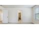 Main bedroom with access to the bathroom and walk-in closet at 15250 Anguilla Isle Ave, Tampa, FL 33647