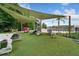 playground with shade structures and lake views at 15250 Anguilla Isle Ave, Tampa, FL 33647