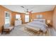 Bright bedroom with natural light and a cozy seating area, offering a comfortable and inviting personal retreat at 6240 Bayside Dr, New Port Richey, FL 34652