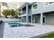 Luxury pool and patio area with modern design at 83 Palm Blvd, Dunedin, FL 34698