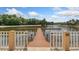 Community dock with lake access and seating area at 15250 Anguilla Isle Ave, Tampa, FL 33647