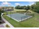 Outdoor basketball court near pond at 15250 Anguilla Isle Ave, Tampa, FL 33647