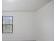Simple bedroom with window and neutral walls at 15250 Anguilla Isle Ave, Tampa, FL 33647