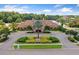 Community clubhouse near lake and lush landscape at 15250 Anguilla Isle Ave, Tampa, FL 33647