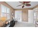 Bright office with a chair, desk, and closet at 6240 Bayside Dr, New Port Richey, FL 34652