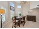 Dining room with wood table, chairs, and built-in hutch at 6240 Bayside Dr, New Port Richey, FL 34652