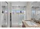 Elegant bathroom with a large walk-in shower and double vanity at 6240 Bayside Dr, New Port Richey, FL 34652