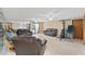 Spacious recreation room with leather couches and home gym at 6240 Bayside Dr, New Port Richey, FL 34652