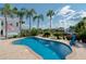 Resort-style pool with patio seating and canal views at 6240 Bayside Dr, New Port Richey, FL 34652