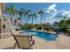 Enjoy this refreshing pool with patio furniture, overlooking the peaceful canal at 6240 Bayside Dr, New Port Richey, FL 34652