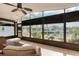 Enjoy waterfront views from this screened porch with wicker furniture at 6240 Bayside Dr, New Port Richey, FL 34652