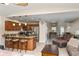 Kitchen features granite countertops, stainless steel appliances, and an island with seating at 6240 Bayside Dr, New Port Richey, FL 34652