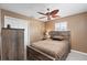 Cozy bedroom with a full-size bed and ample closet space at 6240 Bayside Dr, New Port Richey, FL 34652