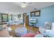 Bright bedroom with hardwood floors, a comfortable bed, and plenty of natural light at 516 Gulf Blvd, Indian Rocks Beach, FL 33785