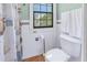 Bathroom with shower stall and decorative tile at 516 Gulf Blvd, Indian Rocks Beach, FL 33785