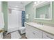 Clean bathroom with white subway tile and updated vanity at 516 Gulf Blvd, Indian Rocks Beach, FL 33785