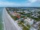 Beachfront home's aerial view showcasing its coastal setting at 516 Gulf Blvd, Indian Rocks Beach, FL 33785