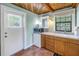 Small kitchenette with microwave, mini-fridge, and sink at 516 Gulf Blvd, Indian Rocks Beach, FL 33785