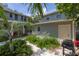 Two-story house with detached garage at 516 Gulf Blvd, Indian Rocks Beach, FL 33785