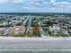 Bird's eye view of beach home with ocean and surrounding buildings visible at 516 Gulf Blvd, Indian Rocks Beach, FL 33785