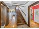 Elegant hardwood staircase leading to upper level at 516 Gulf Blvd, Indian Rocks Beach, FL 33785