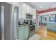 Stainless steel appliances and granite countertops in this updated kitchen at 516 Gulf Blvd, Indian Rocks Beach, FL 33785