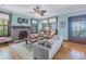 Spacious living room with fireplace and ocean views at 516 Gulf Blvd, Indian Rocks Beach, FL 33785