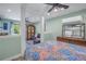 Spacious bedroom with a comfortable bed and access to the living room at 516 Gulf Blvd, Indian Rocks Beach, FL 33785