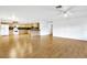 Bright kitchen features light wood cabinets, laminate flooring, and modern appliances at 6700 90Th N Ave, Pinellas Park, FL 33782