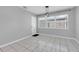 Dining area with tile floor and window at 5542 Atlantic N Ave, St Petersburg, FL 33703