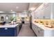 Modern kitchen with a large island and stainless steel appliances at 83 Palm Blvd, Dunedin, FL 34698