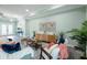 Spacious living area with hardwood floors and stylish decor at 83 Palm Blvd, Dunedin, FL 34698