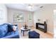 Cozy living room featuring a blue sofa and a modern coffee table at 4000 7Th N Ave, St Petersburg, FL 33713