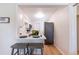 Open kitchen with white cabinets and a breakfast bar at 4000 7Th N Ave, St Petersburg, FL 33713