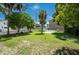 Large backyard with grassy area and mature trees at 4000 7Th N Ave, St Petersburg, FL 33713
