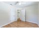 Well-lit bedroom featuring wood floors and a ceiling fan at 4000 7Th N Ave, St Petersburg, FL 33713