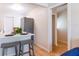 Modern kitchen with white cabinets and stainless steel appliances at 4000 7Th N Ave, St Petersburg, FL 33713