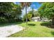 Spacious backyard with grassy area and a gravel patio at 4000 7Th N Ave, St Petersburg, FL 33713