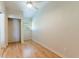 Light-filled bedroom featuring wood-look floors and a ceiling fan at 4000 7Th N Ave, St Petersburg, FL 33713