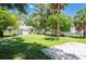 Large backyard with grassy area and mature trees at 4000 7Th N Ave, St Petersburg, FL 33713
