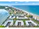 Coastal condo complex with a pool, boat docks, and convenient beach access at 19417 Gulf Blvd # B208, Indian Rocks Beach, FL 33785