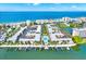 Beautiful coastal condo complex with a shared pool, dock access, and a prime location near the beach and the ocean at 19417 Gulf Blvd # B208, Indian Rocks Beach, FL 33785