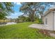 Enjoy the lake view from this backyard patio at 9443 Scott Dr, Seminole, FL 33777