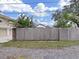 Tall wooden fence offers privacy and separates the property from neighbors at 2809 41St N Ave, St Petersburg, FL 33714