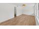 Well-lit bedroom with wood-look floors and a large closet at 2809 41St N Ave, St Petersburg, FL 33714