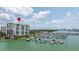 Condo building with water access and marina views at 9525 Blind Pass Rd # 505, St Pete Beach, FL 33706